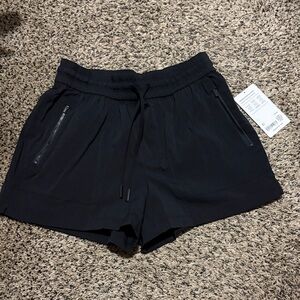 Athleta Trekkie North Black Athletic Drawstring Shorts with Zip Pockets